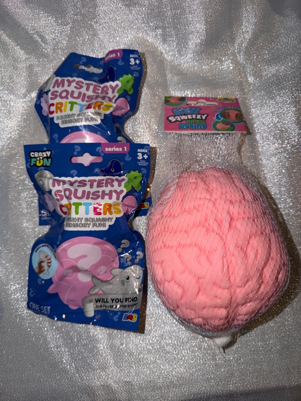 (1) Squeezy Brain Toy & (2) Mystery Squishy Critters Blind Bag